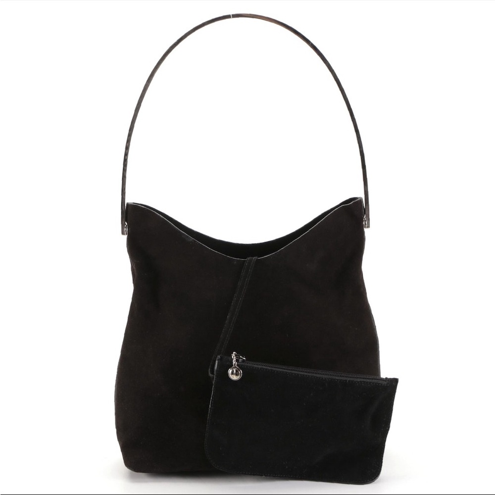 Gucci shoulder bag and zip pouch in black suede .